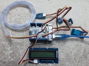 Cover image with a set-up with arduino and sensors for room conditions control